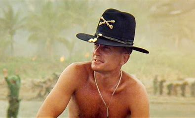 This image features the actor Robert Duvall as Colonel Kilgore the Air Assault battalion commander shortly after his unit assaulted the beach. The shot is at the end of his famous "i love the small of napalm" speech.